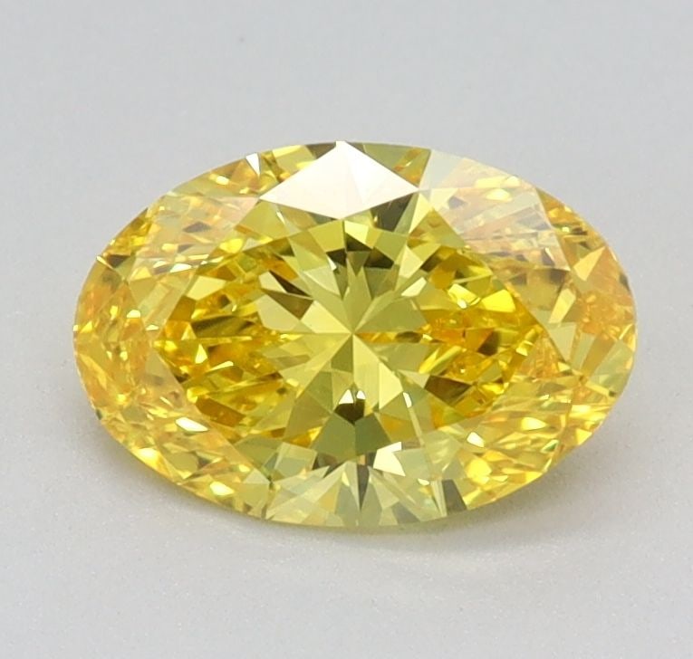 Loose Diamond - OVAL 0.7ct Fancy Vivid Yellow VS1: Loose Diamond - OVAL 0.7ct Fancy Vivid Yellow VS1 Source: This is a real non-mined Diamond that has been grown in a lab Shape: OVAL Carats: 0.7 Color: Fancy Vivid Yellow Certification: IGI Video: