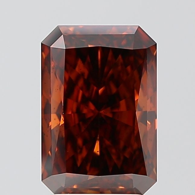 Loose Diamond - RADIANT 2.73ct Fancy Intense Brownish Orange SI2: Loose Diamond - RADIANT 2.73ct Fancy Intense Brownish Orange SI2 Source: This is a real non-mined Diamond that has been grown in a lab Shape: RADIANT Carats: 2.73 Color: Fancy Intense Brownish Orange 