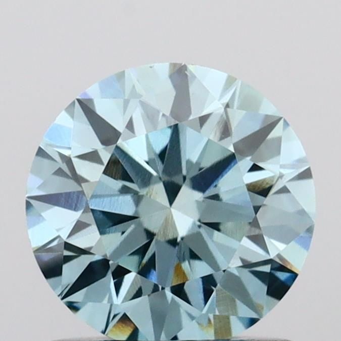 Ideal Loose Diamond - ROUND 0.91ct Fancy Vivid Blue VS1: Ideal Loose Diamond - ROUND 0.91ct Fancy Vivid Blue VS1 Source: This is a real non-mined Diamond that has been grown in a lab Shape: ROUND Carats: 0.91 Color: Fancy Vivid Blue Certification: IGI Video