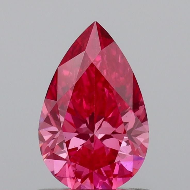 Loose Diamond - PEAR 0.75ct Fancy Vivid Pink VS2: Loose Diamond - PEAR 0.75ct Fancy Vivid Pink VS2 Source: This is a real non-mined Diamond that has been grown in a lab Shape: PEAR Carats: 0.75 Color: Fancy Vivid Pink Certification: IGI Video: