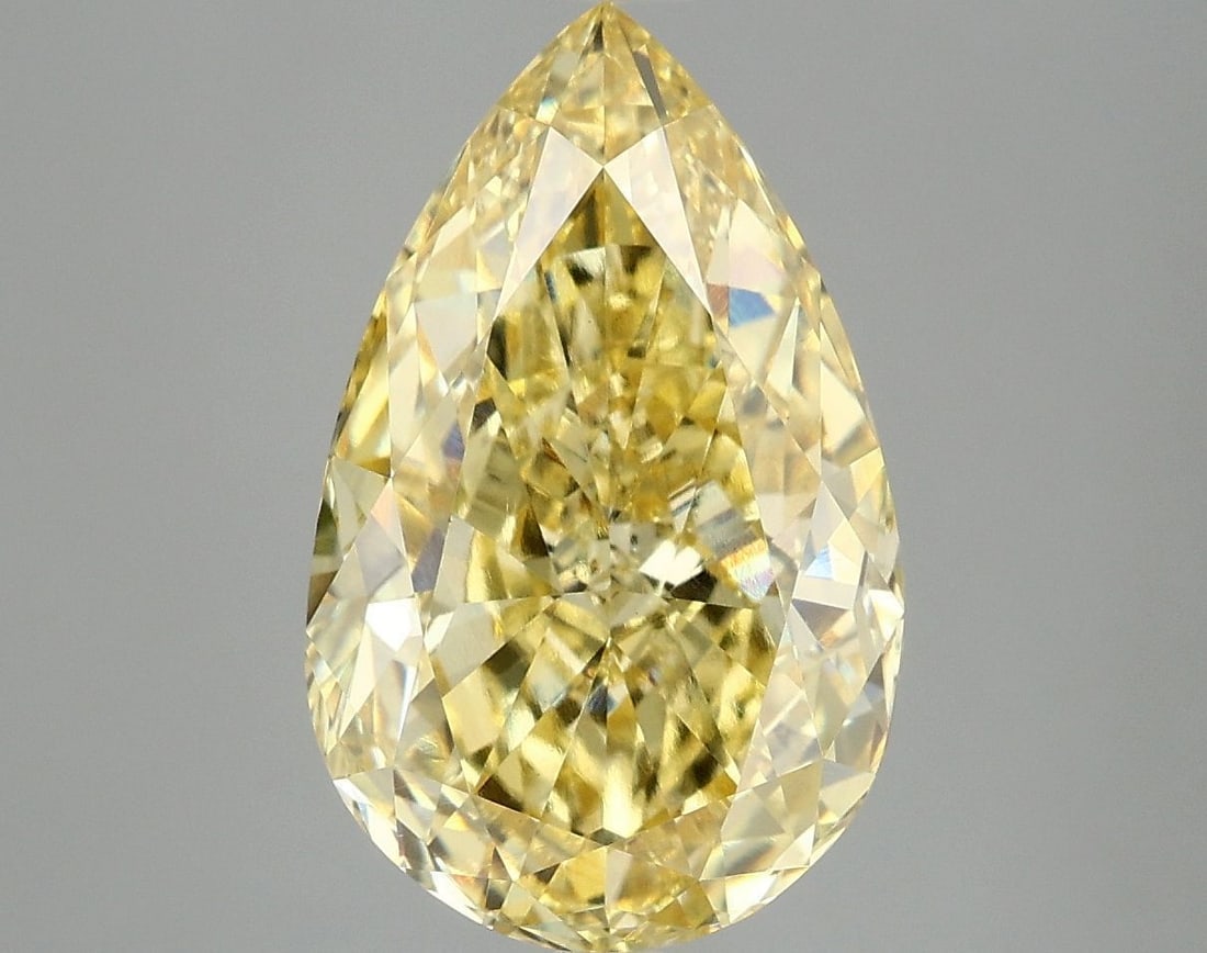 Loose Diamond - PEAR 5.1ct Fancy Vivid Yellow VVS2: Loose Diamond - PEAR 5.1ct Fancy Vivid Yellow VVS2 Source: This is a real non-mined Diamond that has been grown in a lab Shape: PEAR Carats: 5.1 Color: Fancy Vivid Yellow Certification: IGI Video: