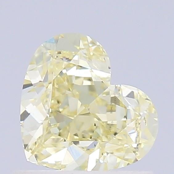 Loose Diamond - HEART 1.0ct Fancy Light Yellow VS2: Loose Diamond - HEART 1.0ct Fancy Light Yellow VS2 Source: This is a real non-mined Diamond that has been grown in a lab Shape: HEART Carats: 1.0 Color: Fancy Light Yellow Certification: IGI Video: