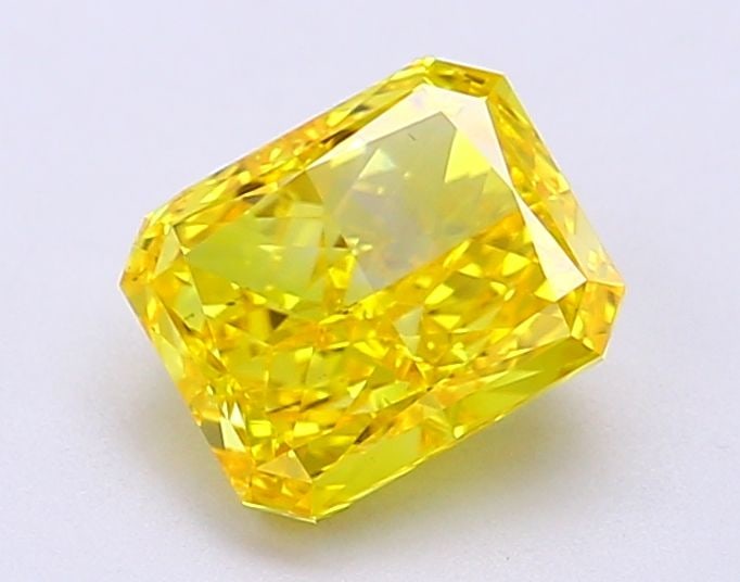 Loose Diamond - RADIANT 1.4ct Fancy Vivid Yellow VS2: Loose Diamond - RADIANT 1.4ct Fancy Vivid Yellow VS2 Source: This is a real non-mined Diamond that has been grown in a lab Shape: RADIANT Carats: 1.4 Color: Fancy Vivid Yellow Certification: IGI Video