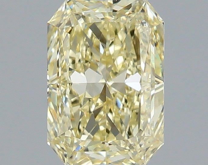 Loose Diamond - RADIANT 1.59ct Fancy Yellow VVS2: Loose Diamond - RADIANT 1.59ct Fancy Yellow VVS2 Source: This is a real non-mined Diamond that has been grown in a lab Shape: RADIANT Carats: 1.59 Color: Fancy Yellow Certification: IGI Video: