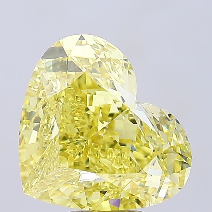 Loose Diamond - HEART 11.41ct Fancy Vivid Yellow VS2: Loose Diamond - HEART 11.41ct Fancy Vivid Yellow VS2 Source: This is a real non-mined Diamond that has been grown in a lab Shape: HEART Carats: 11.41 Color: Fancy Vivid Yellow Certification: IGI Video