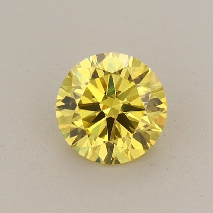 Loose Diamond - ROUND 0.47ct Fancy Vivid Yellow VVS2: Loose Diamond - ROUND 0.47ct Fancy Vivid Yellow VVS2 Source: This is a real non-mined Diamond that has been grown in a lab Shape: ROUND Carats: 0.47 Color: Fancy Vivid Yellow Certification: IGI Video: