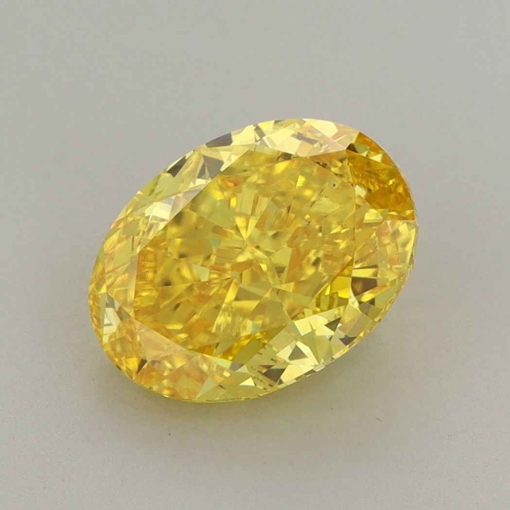 Loose Diamond - OVAL 2.78ct Fancy Vivid Yellow VS2: Loose Diamond - OVAL 2.78ct Fancy Vivid Yellow VS2 Source: This is a real non-mined Diamond that has been grown in a lab Shape: OVAL Carats: 2.78 Color: Fancy Vivid Yellow Certification: IGI Video: