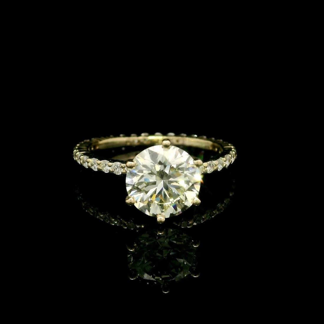 14k Yellow Gold GIA 2.59ctw Round Light Yellow Diamond Engagement Ring: 14k Yellow Gold GIA 2.59ctw Round Light Yellow Diamond Engagement Ring This stunning engagement ring features a striking 14k yellow gold band adorned with a remarkable natural genuine diamond. The cen