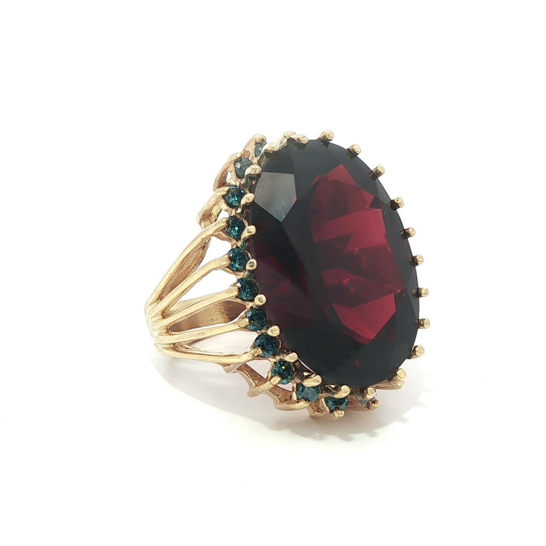 14k Yellow Gold 19.50ctw Garnet Diamond Halo Cocktail Ring: 14k Yellow Gold 19.50ctw Garnet Diamond Halo Cocktail Ring This stunning cocktail ring features a large, natural oval-cut garnet, measuring approximately 21.9x15.6mm, set in a beautiful halo of both w