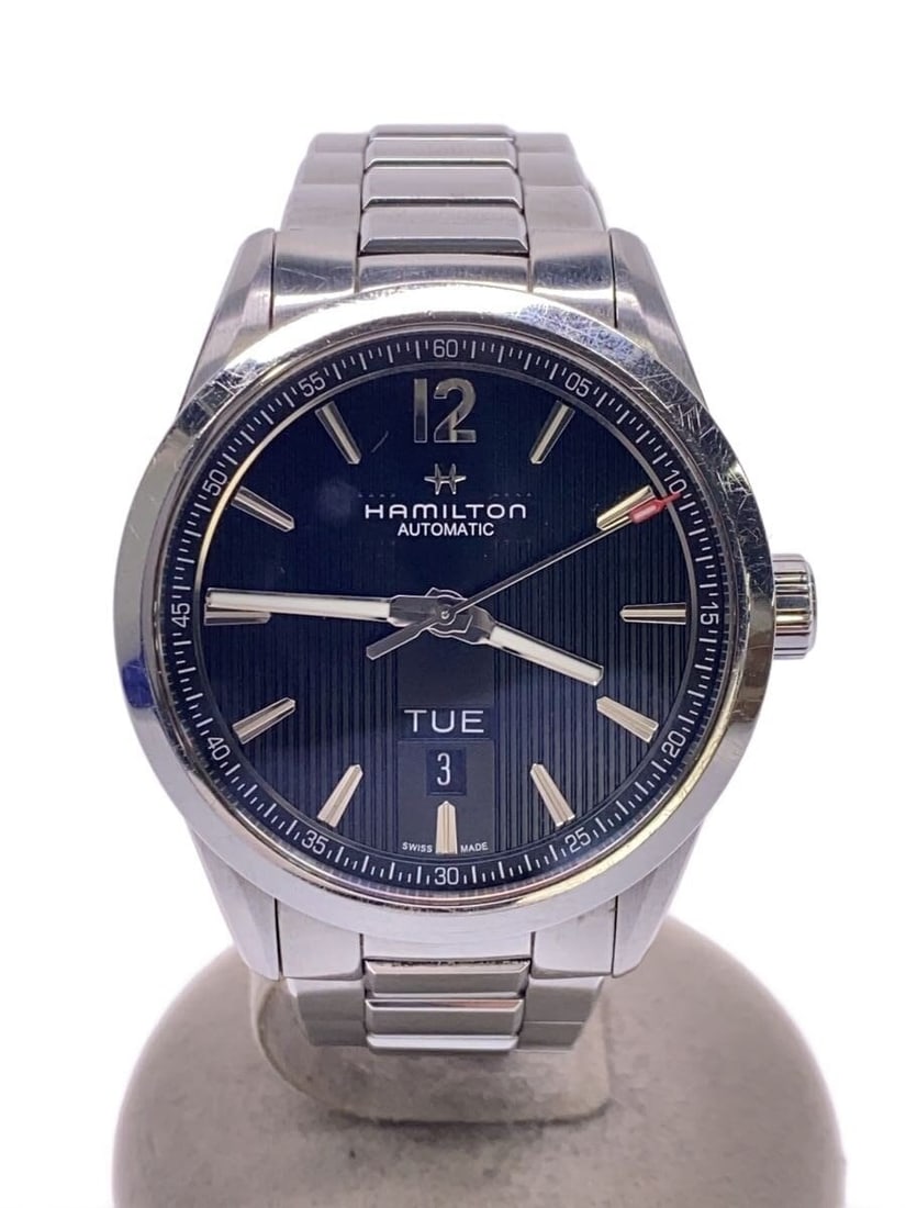 Hamilton stainless steel Broadway automatic day-date men's wristwatch: Hamilton stainless steel Broadway automatic day-date men's wristwatch This Hamilton Broadway Day-Date Automatic men's wristwatch features a stainless steel case and band with a black dial. Manufacture
