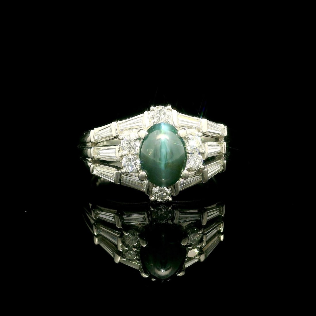 Platinum GIA Certified 2.78ct Cat's Eye Alexandrite & Diamond Ring: Platinum GIA Certified 2.78ct Cat's Eye Alexandrite & Diamond Ring This stunning cocktail ring showcases a remarkable 2.78 carat total weight, featuring a mesmerizing Cat's Eye Alexandrite at its cent