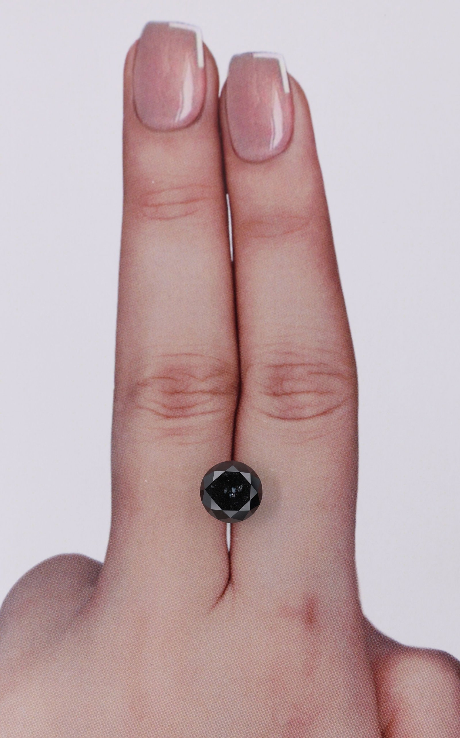 Loose Diamond - ROUND 2.53ct Black: Loose Diamond - ROUND 2.53ct Black Source: Natural Shape: ROUND Carats: 2.53 Color: Black Certification: IGI Video: