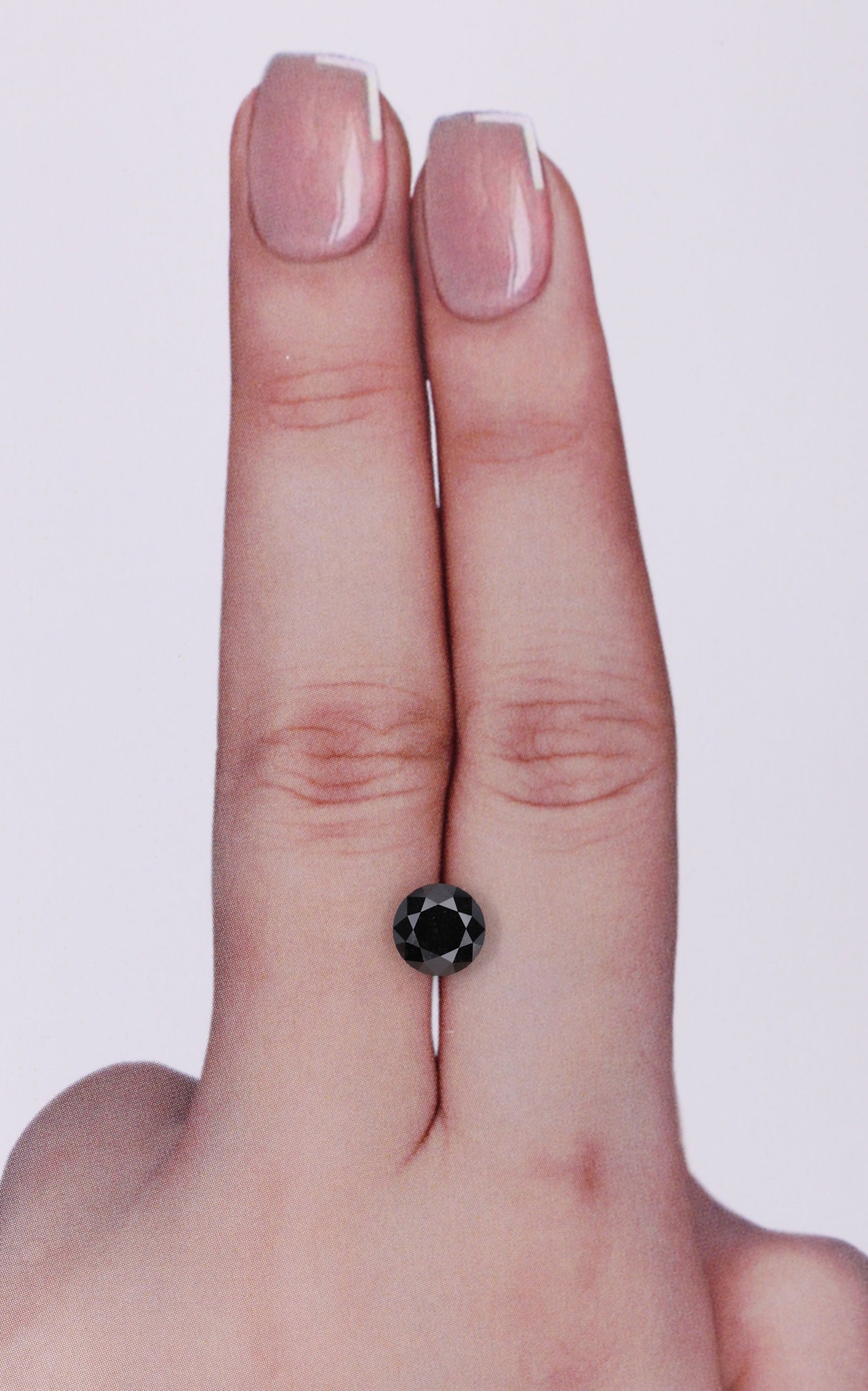 Loose Diamond - ROUND 1.12ct Fancy Black VVS2: Loose Diamond - ROUND 1.12ct Fancy Black VVS2 Source: Natural Shape: ROUND Carats: 1.12 Color: Fancy Black Certification: GIA Video: