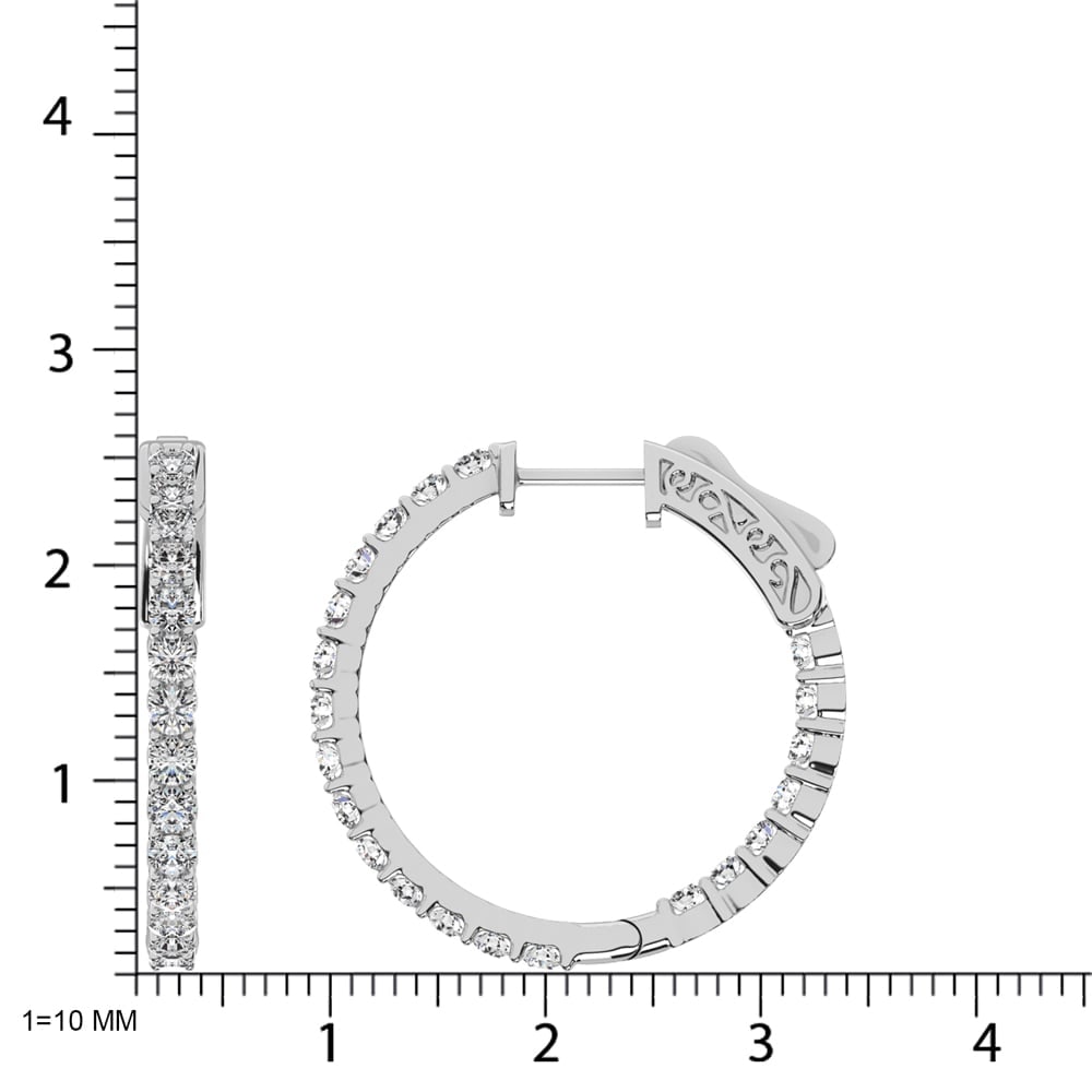 10K White Gold Diamond 2 Ct.Tw. In and Out Hoop Earrings: 10K White Gold Diamond 2 Ct.Tw. In and Out Hoop Earrings These stunning earrings are available in 10K White Gold. There are 21 round diamonds with a total carat weight of 2 Ct.Tw. set in a Prong setti
