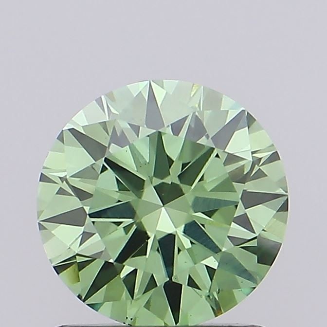 Loose Diamond - ROUND 0.91ct Fancy Vivid Green VS1: Loose Diamond - ROUND 0.91ct Fancy Vivid Green VS1 Source: This is a real non-mined Diamond that has been grown in a lab Shape: ROUND Carats: 0.91 Color: Fancy Vivid Green Certification: IGI Video: