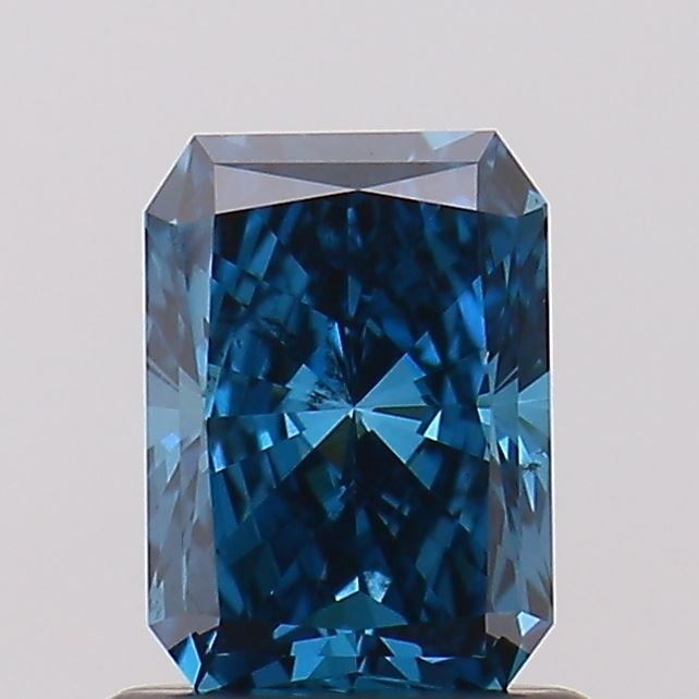 Loose Diamond - RADIANT 0.84ct Fancy Vivid Blue SI1: Loose Diamond - RADIANT 0.84ct Fancy Vivid Blue SI1 Source: This is a real non-mined Diamond that has been grown in a lab Shape: RADIANT Carats: 0.84 Color: Fancy Vivid Blue Certification: NONE Video: