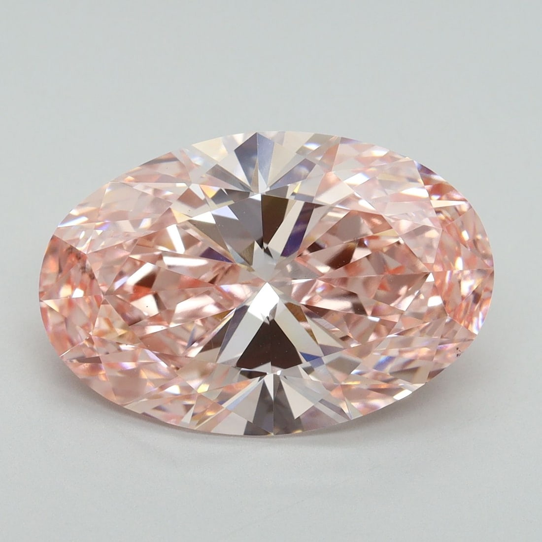 Loose Diamond - OVAL 7.18ct Fancy Vivid Pink VS1: Loose Diamond - OVAL 7.18ct Fancy Vivid Pink VS1 Source: This is a real non-mined Diamond that has been grown in a lab Shape: OVAL Carats: 7.18 Color: Fancy Vivid Pink Certification: IGI Video: