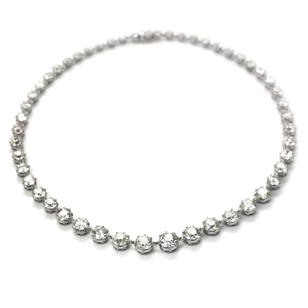 GIA Certified 51.08 Ct Platinum Diamond Tennis Necklace: GIA Certified 51.08 Ct Platinum Diamond Tennis Necklace This stunning Platinum Diamond Tennis Necklace features an impressive total diamond weight of 51.08 carats. The centerpiece is a GIA Certified d