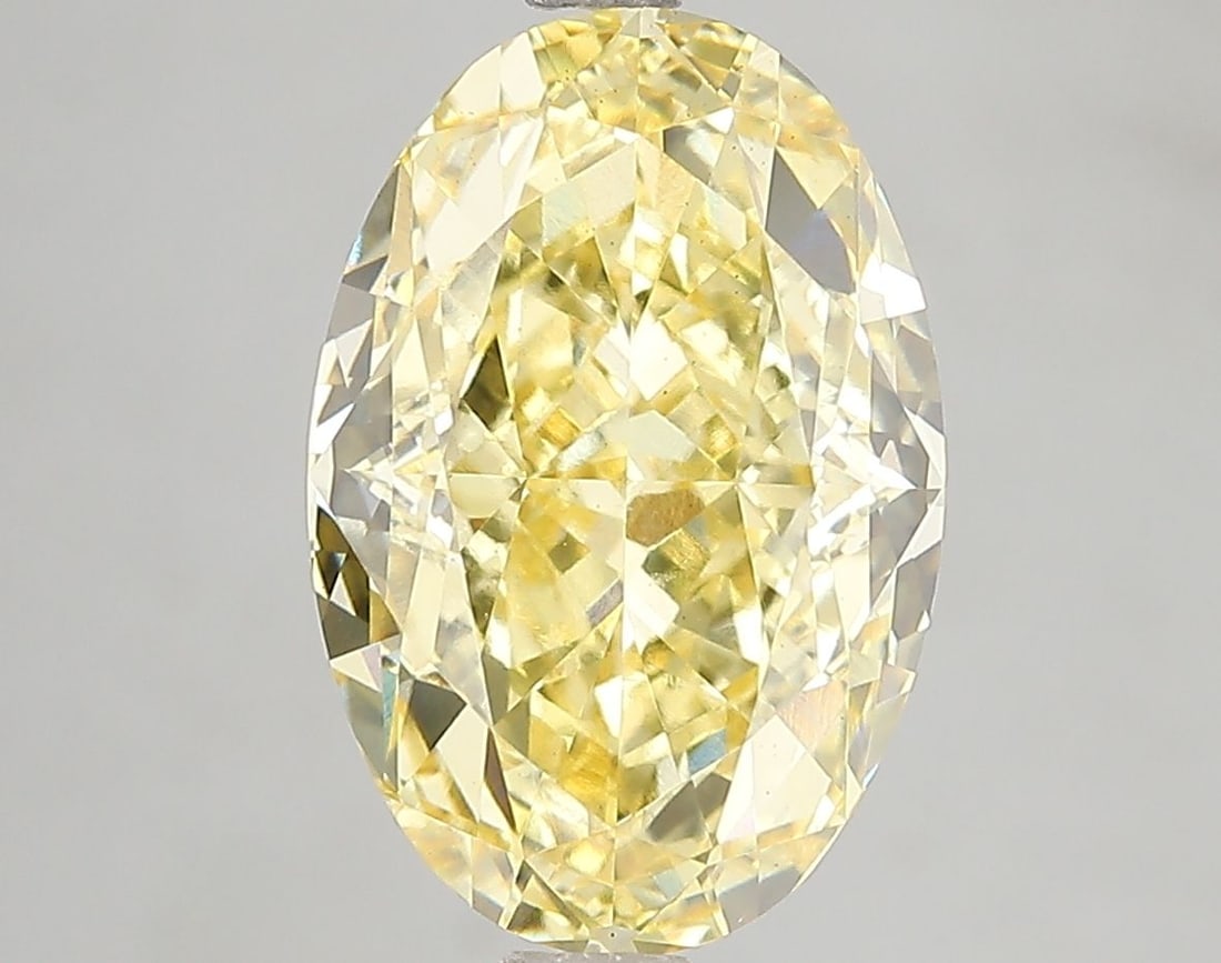 Loose Diamond - OVAL 5.05ct Fancy Vivid Yellow VS1: Loose Diamond - OVAL 5.05ct Fancy Vivid Yellow VS1 Source: This is a real non-mined Diamond that has been grown in a lab Shape: OVAL Carats: 5.05 Color: Fancy Vivid Yellow Certification: IGI Video: