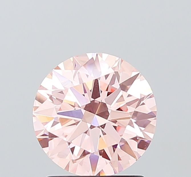 Ideal Loose Diamond - ROUND 1.57ct Fancy Intense Pink VVS2: Ideal Loose Diamond - ROUND 1.57ct Fancy Intense Pink VVS2 Source: This is a real non-mined Diamond that has been grown in a lab Shape: ROUND Carats: 1.57 Color: Fancy Intense Pink Certification: IGI 