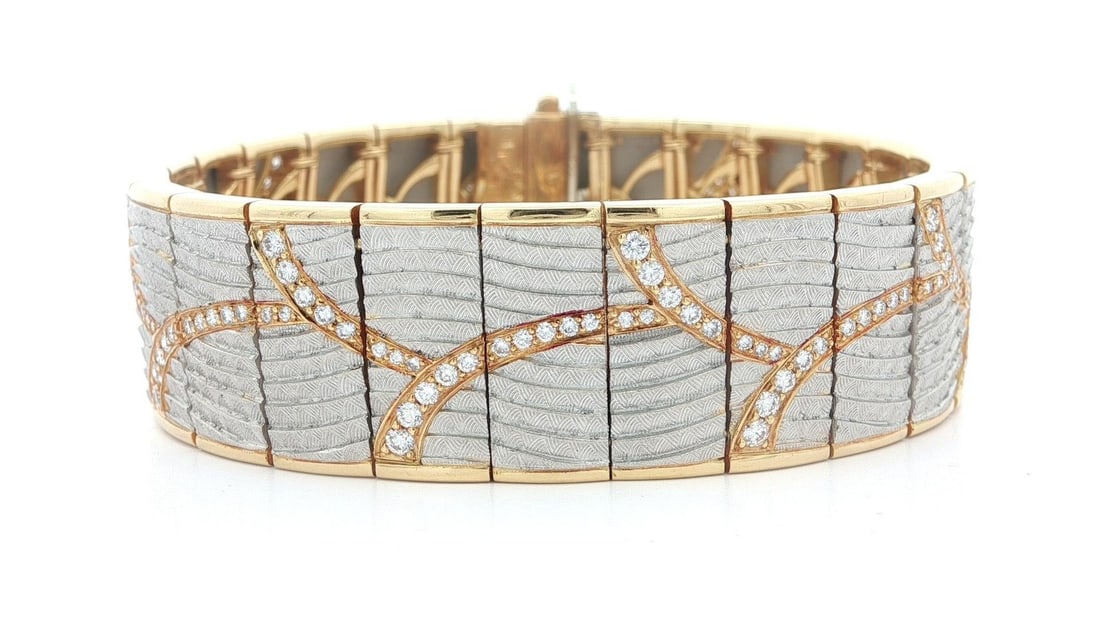 Michael Bondanza Venti 18k Gold Platinum Diamond Wide Bracelet: Michael Bondanza Venti 18k Gold Platinum Diamond Wide Bracelet This stunning wide bracelet from Michael Bondanza features an exquisite combination of 18k solid yellow gold and platinum, showcasing num