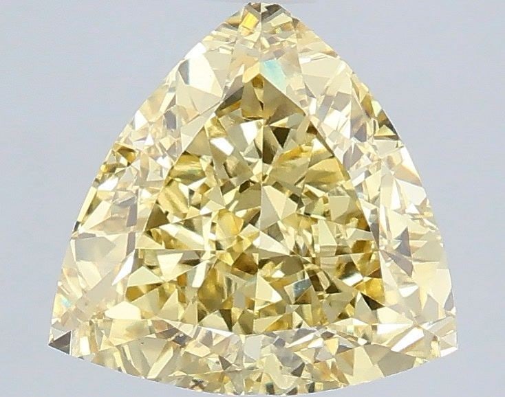 Loose Diamond - TRIANGULAR 3.09ct Fancy Yellow VVS2: Loose Diamond - TRIANGULAR 3.09ct Fancy Yellow VVS2 Source: This is a real non-mined Diamond that has been grown in a lab Shape: TRIANGULAR Carats: 3.09 Color: Fancy Yellow Certification: IGI Video: