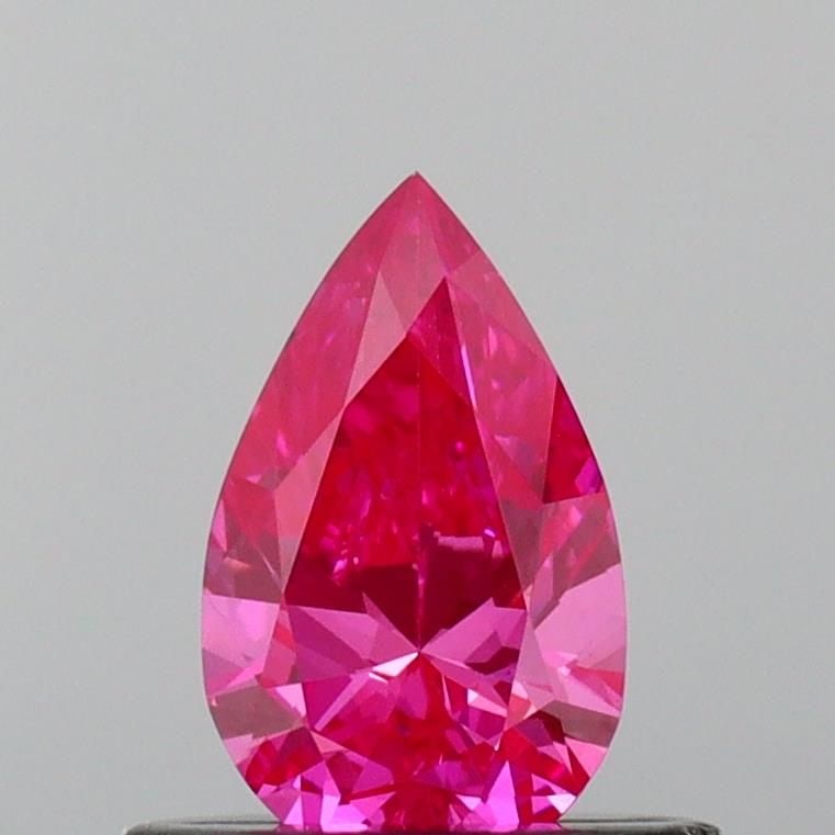 Loose Diamond - PEAR 0.44ct Fancy Vivid Pink VS1: Loose Diamond - PEAR 0.44ct Fancy Vivid Pink VS1 Source: This is a real non-mined Diamond that has been grown in a lab Shape: PEAR Carats: 0.44 Color: Fancy Vivid Pink Certification: IGI Video: