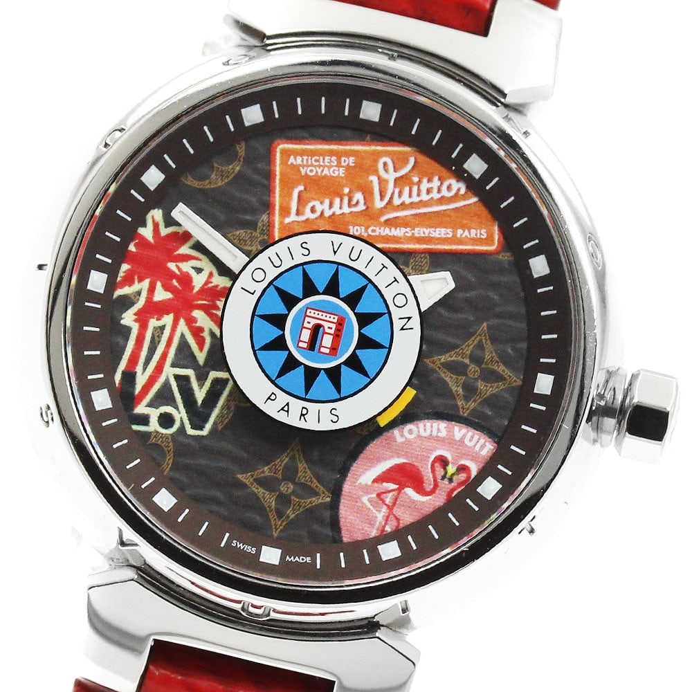 Louis Vuitton Tambour World Tour QA062 Ladies Quartz Wristwatch: Louis Vuitton Tambour World Tour QA062 Ladies Quartz Wristwatch Louis Vuitton Tambour World Tour women's wristwatch, reference QA062, made in Switzerland. This pre-owned quartz watch features a stainl