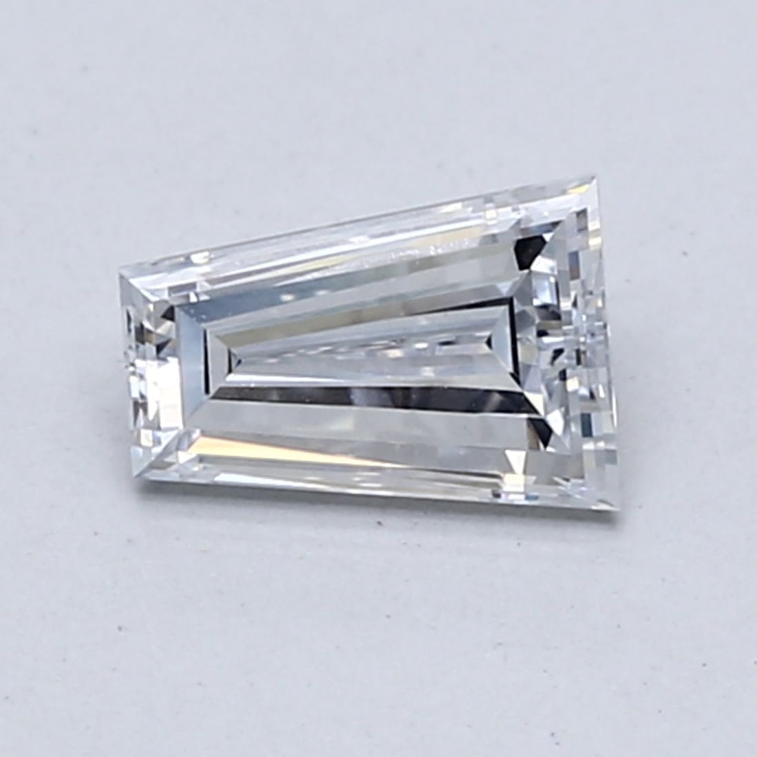 Loose Diamond - TAPERED BAGUETTE 0.73ct Fancy Light Blue VS1: Loose Diamond - TAPERED BAGUETTE 0.73ct Fancy Light Blue VS1 Source: This is a real non-mined Diamond that has been grown in a lab Shape: TAPERED BAGUETTE Carats: 0.73 Color: Fancy Light Blue Certific