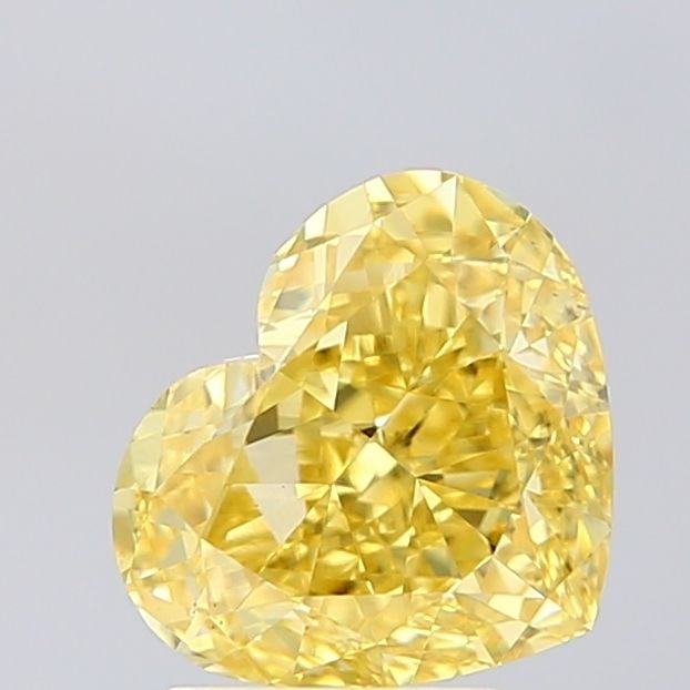 Loose Diamond - HEART 2.59ct Fancy Vivid Yellow VS1: Loose Diamond - HEART 2.59ct Fancy Vivid Yellow VS1 Source: This is a real non-mined Diamond that has been grown in a lab Shape: HEART Carats: 2.59 Color: Fancy Vivid Yellow Certification: IGI Video: