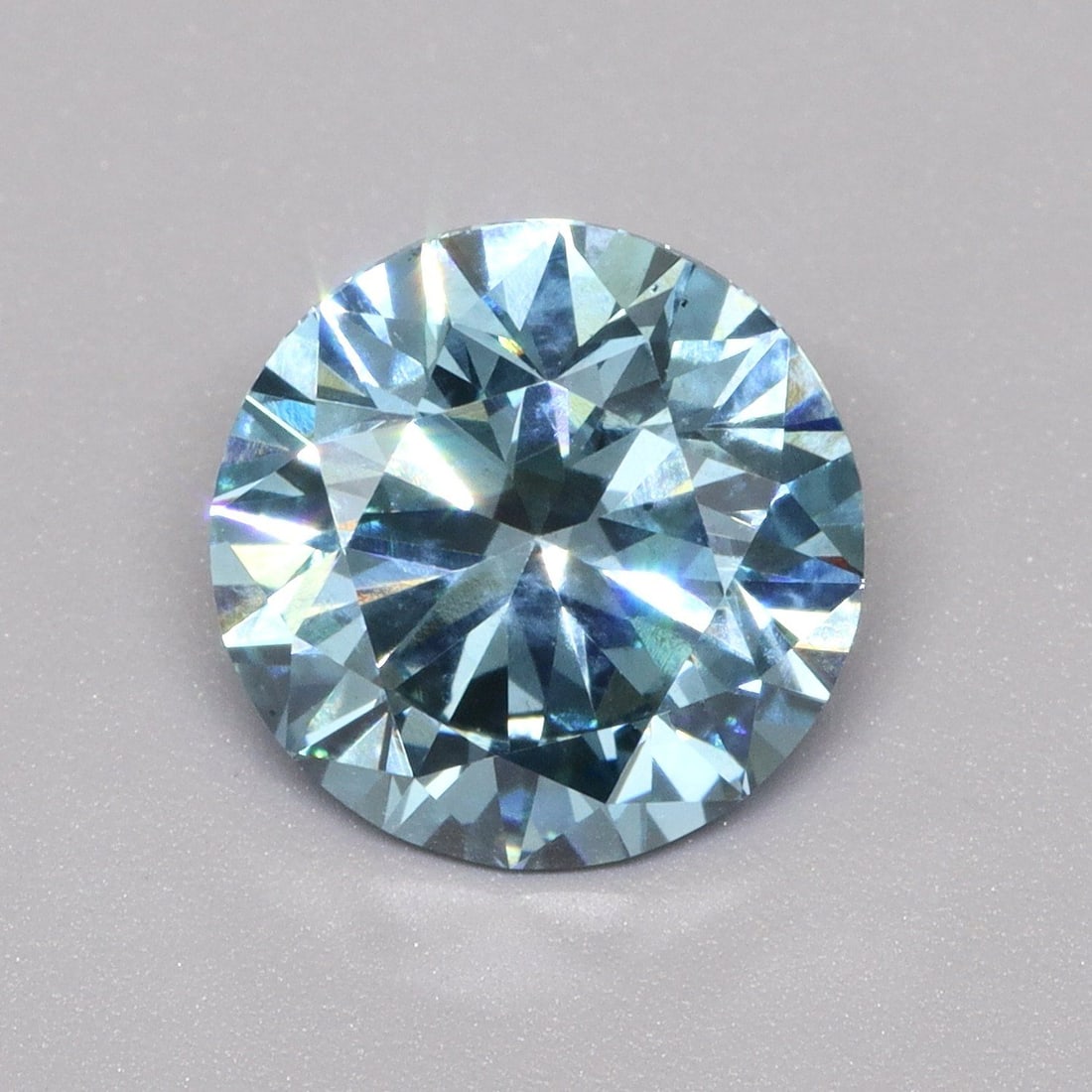 Loose Diamond - ROUND 1.57ct Fancy Vivid Blue SI1: Loose Diamond - ROUND 1.57ct Fancy Vivid Blue SI1 Source: This is a real non-mined Diamond that has been grown in a lab Shape: ROUND Carats: 1.57 Color: Fancy Vivid Blue Certification: IGI Video: