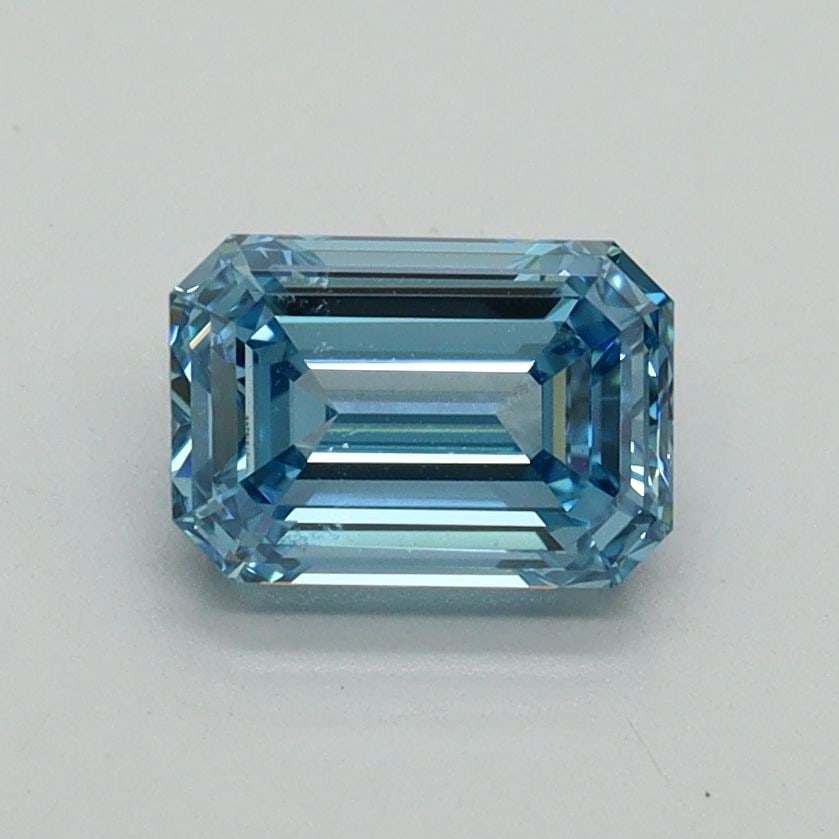 Loose Diamond - EMERALD 1.03ct Fancy Vivid Blue VVS2: Loose Diamond - EMERALD 1.03ct Fancy Vivid Blue VVS2 Source: This is a real non-mined Diamond that has been grown in a lab Shape: EMERALD Carats: 1.03 Color: Fancy Vivid Blue Certification: IGI Video: