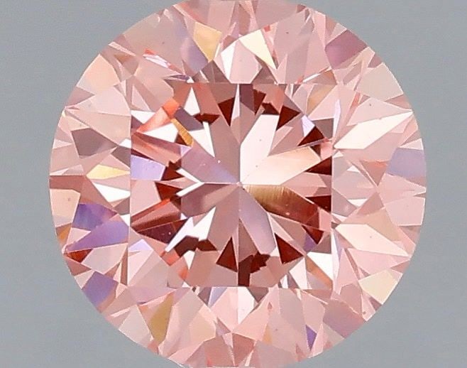 Loose Diamond - ROUND 1.24ct Fancy Vivid Pink VS2: Loose Diamond - ROUND 1.24ct Fancy Vivid Pink VS2 Source: This is a real non-mined Diamond that has been grown in a lab Shape: ROUND Carats: 1.24 Color: Fancy Vivid Pink Certification: IGI Video: