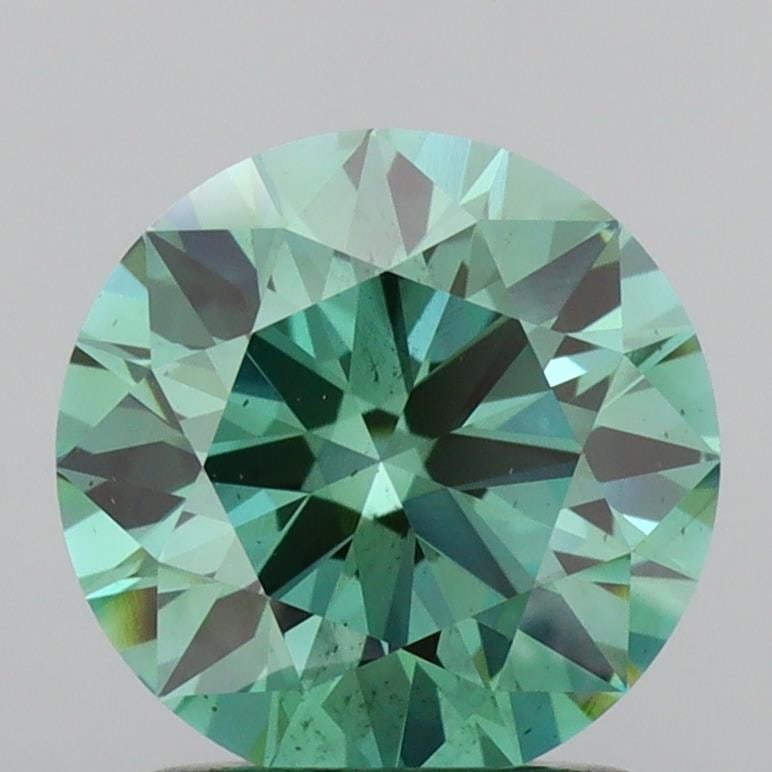 Ideal Loose Diamond - ROUND 1.44ct Fancy Vivid Green VS2: Ideal Loose Diamond - ROUND 1.44ct Fancy Vivid Green VS2 Source: This is a real non-mined Diamond that has been grown in a lab Shape: ROUND Carats: 1.44 Color: Fancy Vivid Green Certification: IGI Vid