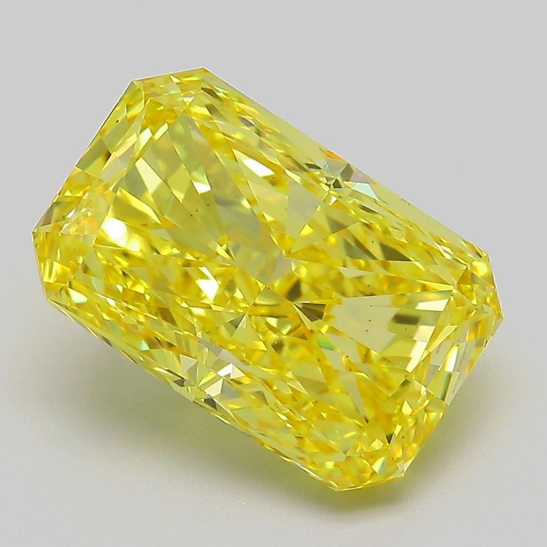 Loose Diamond - RADIANT 6.02ct Fancy Vivid Yellow VS1: Loose Diamond - RADIANT 6.02ct Fancy Vivid Yellow VS1 Source: This is a real non-mined Diamond that has been grown in a lab Shape: RADIANT Carats: 6.02 Color: Fancy Vivid Yellow Certification: IGI Vid
