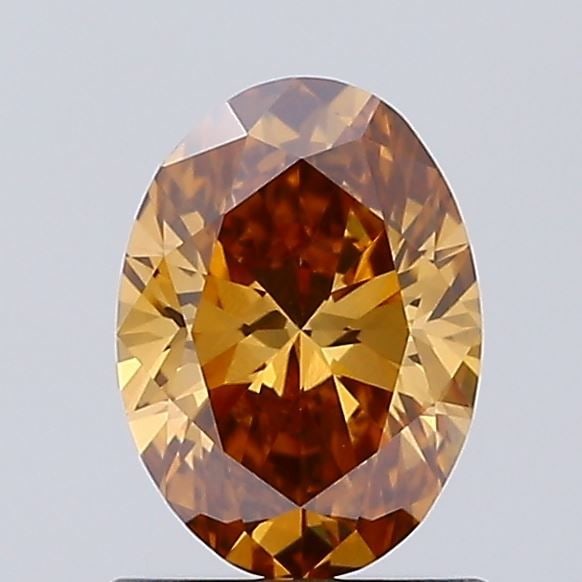 Loose Diamond - OVAL 0.86ct Fancy Orangey Brown VVS2: Loose Diamond - OVAL 0.86ct Fancy Orangey Brown VVS2 Source: This is a real non-mined Diamond that has been grown in a lab Shape: OVAL Carats: 0.86 Color: Fancy Orangey Brown Certification: IGI Video: