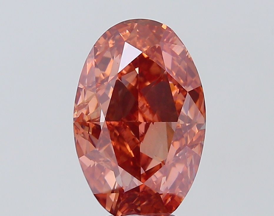 Loose Diamond - OVAL 5.01ct Fancy Orange Brown VVS2: Loose Diamond - OVAL 5.01ct Fancy Orange Brown VVS2 Source: This is a real non-mined Diamond that has been grown in a lab Shape: OVAL Carats: 5.01 Color: Fancy Orange Brown Certification: IGI Video: