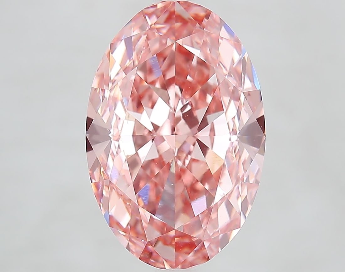Loose Diamond - OVAL 6.86ct Fancy Vivid Pink VVS2: Loose Diamond - OVAL 6.86ct Fancy Vivid Pink VVS2 Source: This is a real non-mined Diamond that has been grown in a lab Shape: OVAL Carats: 6.86 Color: Fancy Vivid Pink Certification: IGI Video: