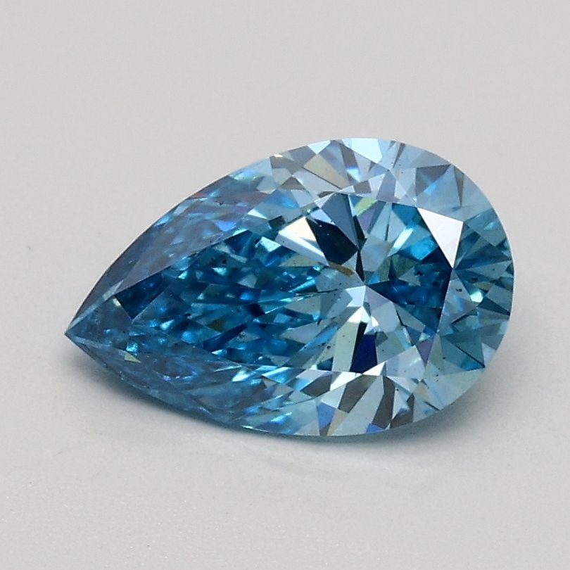 Loose Diamond - PEAR 0.74ct Fancy Vivid Blue SI1: Loose Diamond - PEAR 0.74ct Fancy Vivid Blue SI1 Source: This is a real non-mined Diamond that has been grown in a lab Shape: PEAR Carats: 0.74 Color: Fancy Vivid Blue Certification: IGI Video: