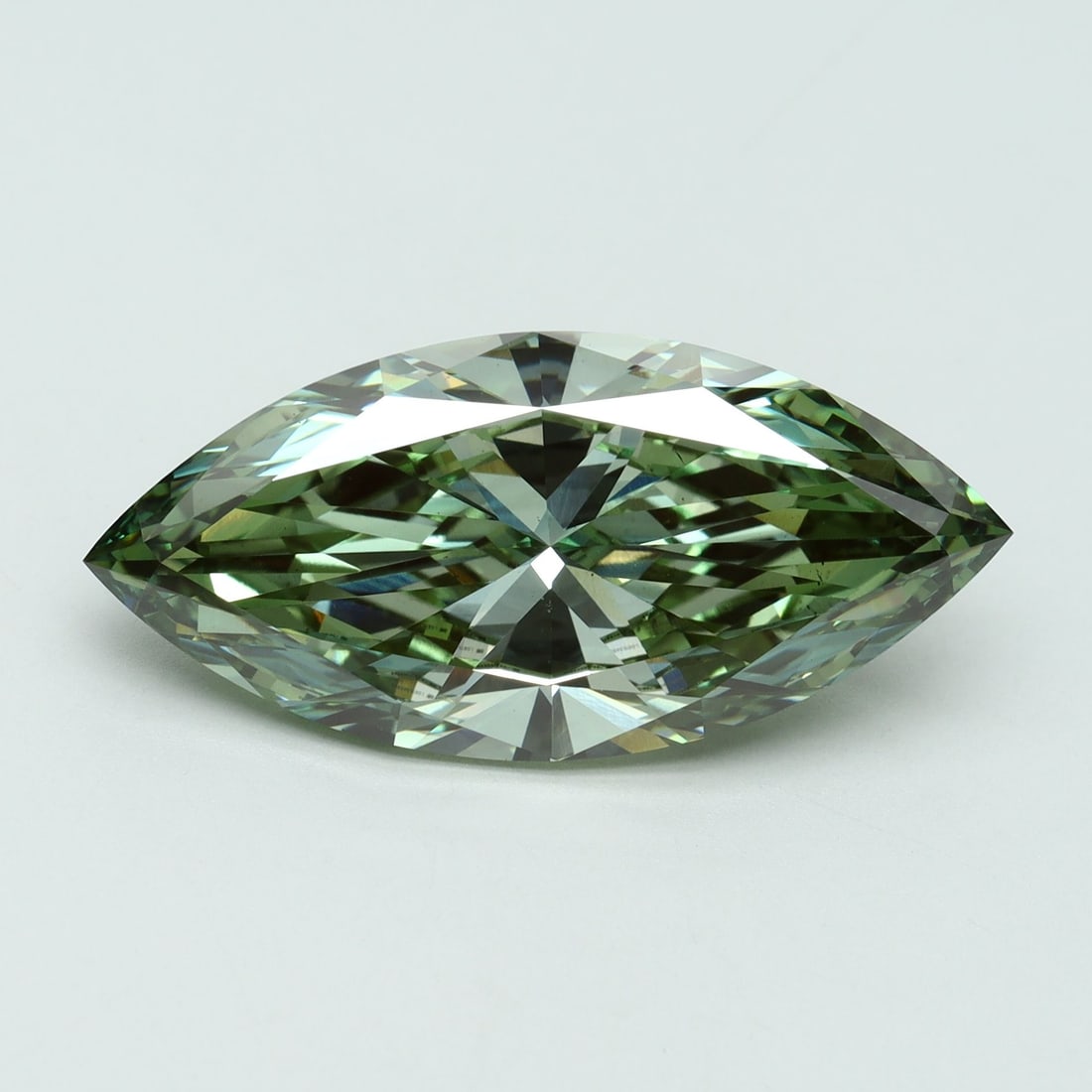 Loose Diamond - MARQUISE 7.06ct Fancy Vivid Green VS1: Loose Diamond - MARQUISE 7.06ct Fancy Vivid Green VS1 Source: This is a real non-mined Diamond that has been grown in a lab Shape: MARQUISE Carats: 7.06 Color: Fancy Vivid Green Certification: IGI Vid