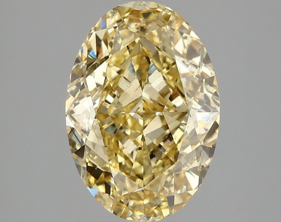 Loose Diamond - OVAL 3.06ct Fancy Intense Yellow VS2: Loose Diamond - OVAL 3.06ct Fancy Intense Yellow VS2 Source: This is a real non-mined Diamond that has been grown in a lab Shape: OVAL Carats: 3.06 Color: Fancy Intense Yellow Certification: IGI Video