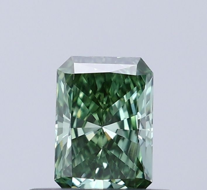 Loose Diamond - RADIANT 0.34ct Fancy Vivid Green VS1: Loose Diamond - RADIANT 0.34ct Fancy Vivid Green VS1 Source: This is a real non-mined Diamond that has been grown in a lab Shape: RADIANT Carats: 0.34 Color: Fancy Vivid Green Certification: IGI Video