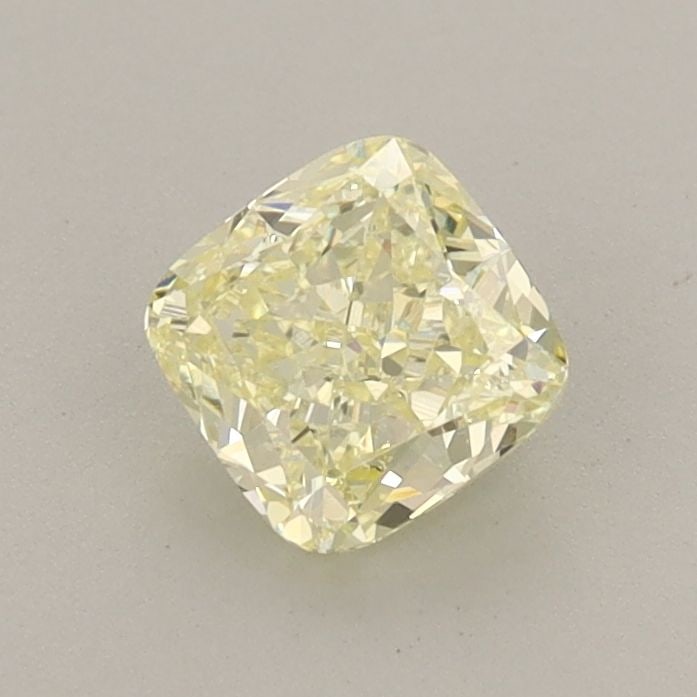 Loose Diamond - CUSHION MODIFIED 0.71ct Fancy Light Yellow VS2: Loose Diamond - CUSHION MODIFIED 0.71ct Fancy Light Yellow VS2 Source: This is a real non-mined Diamond that has been grown in a lab Shape: CUSHION MODIFIED Carats: 0.71 Color: Fancy Light Yellow Cert