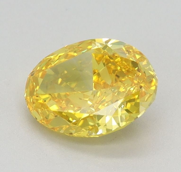 Loose Diamond - OVAL 0.8ct Fancy Vivid Yellow VS1: Loose Diamond - OVAL 0.8ct Fancy Vivid Yellow VS1 Source: This is a real non-mined Diamond that has been grown in a lab Shape: OVAL Carats: 0.8 Color: Fancy Vivid Yellow Certification: IGI Video: