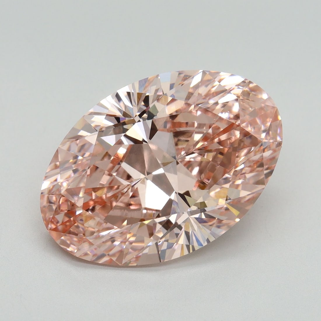 Loose Diamond - OVAL 10.19ct Fancy Intense Pink VVS2: Loose Diamond - OVAL 10.19ct Fancy Intense Pink VVS2 Source: This is a real non-mined Diamond that has been grown in a lab Shape: OVAL Carats: 10.19 Color: Fancy Intense Pink Certification: IGI Video: