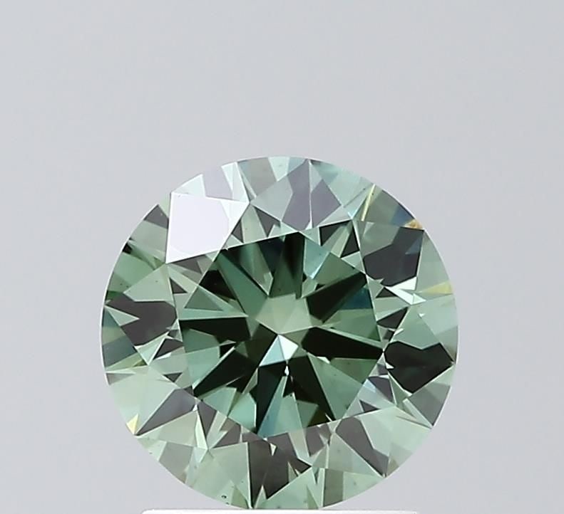 Ideal Loose Diamond - ROUND 1.59ct Fancy Vivid Green VS1: Ideal Loose Diamond - ROUND 1.59ct Fancy Vivid Green VS1 Source: This is a real non-mined Diamond that has been grown in a lab Shape: ROUND Carats: 1.59 Color: Fancy Vivid Green Certification: IGI Vid