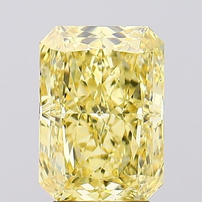 Loose Diamond - RADIANT 2.73ct Fancy Vivid Yellow VS2: Loose Diamond - RADIANT 2.73ct Fancy Vivid Yellow VS2 Source: This is a real non-mined Diamond that has been grown in a lab Shape: RADIANT Carats: 2.73 Color: Fancy Vivid Yellow Certification: IGI Vid
