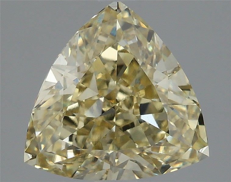 Loose Diamond - TRIANGULAR 2.08ct Fancy Yellow VS1: Loose Diamond - TRIANGULAR 2.08ct Fancy Yellow VS1 Source: This is a real non-mined Diamond that has been grown in a lab Shape: TRIANGULAR Carats: 2.08 Color: Fancy Yellow Certification: IGI Video: