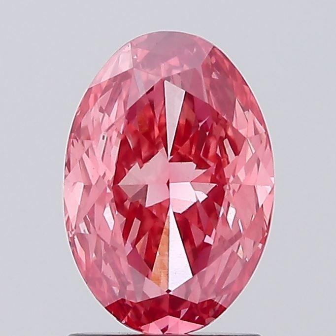Loose Diamond - OVAL 1.56ct Fancy Vivid Pink VS1: Loose Diamond - OVAL 1.56ct Fancy Vivid Pink VS1 Source: This is a real non-mined Diamond that has been grown in a lab Shape: OVAL Carats: 1.56 Color: Fancy Vivid Pink Certification: IGI Video:
