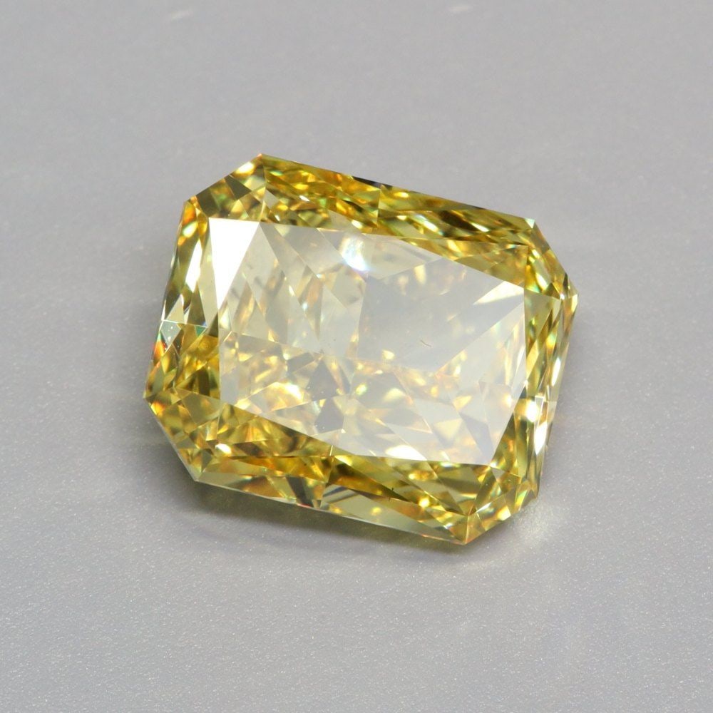 Loose Diamond - RADIANT 5.01ct Fancy Intense Yellow VS1: Loose Diamond - RADIANT 5.01ct Fancy Intense Yellow VS1 Source: This is a real non-mined Diamond that has been grown in a lab Shape: RADIANT Carats: 5.01 Color: Fancy Intense Yellow Certification: IGI